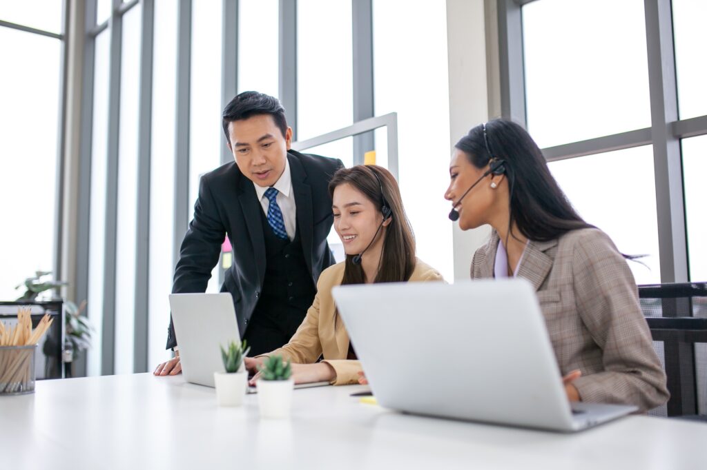 Supervisors teach work to employees in the office, Business concept.